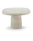 Poppy side table in natural travertine with characteristic holes and pits – theMADgroup