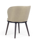 Audrey CB armchair with modern curved back and sleek frame | theMADgroup