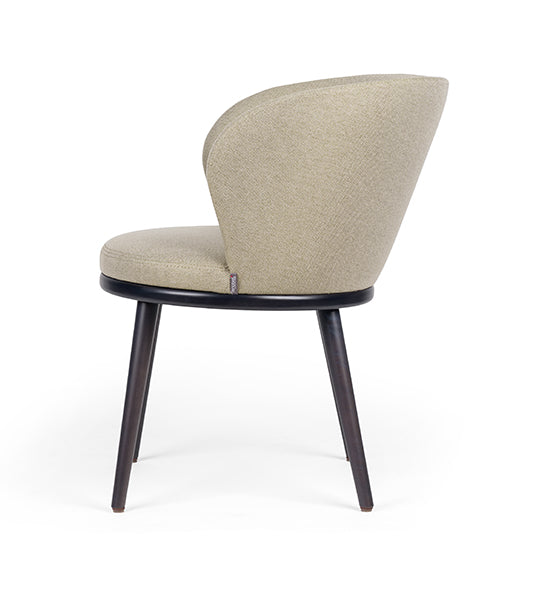 Audrey CB armchair with modern curved back and sleek frame | theMADgroup