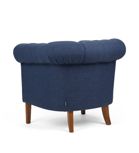 Chesterfield lounge chair with tufted detailing and timeless design | theMADgroup