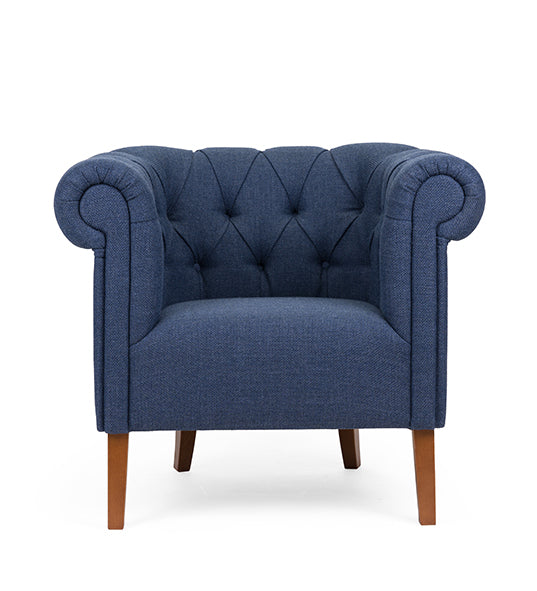 Chesterfield lounge chair with tufted detailing and timeless design | theMADgroup