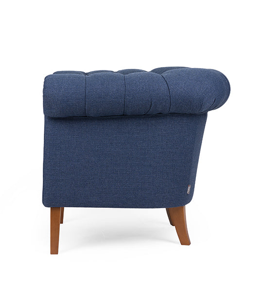 Chesterfield lounge chair with tufted detailing and timeless design | theMADgroup