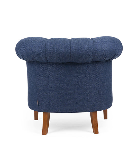 Chesterfield lounge chair with tufted detailing and timeless design | theMADgroup