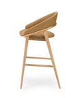 Tagada EST Bar Stool with elevated frame and curved modern seat | theMADgroup