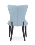 Flower 01 CB armchair with elegant curves and grounded presence | theMADgroup