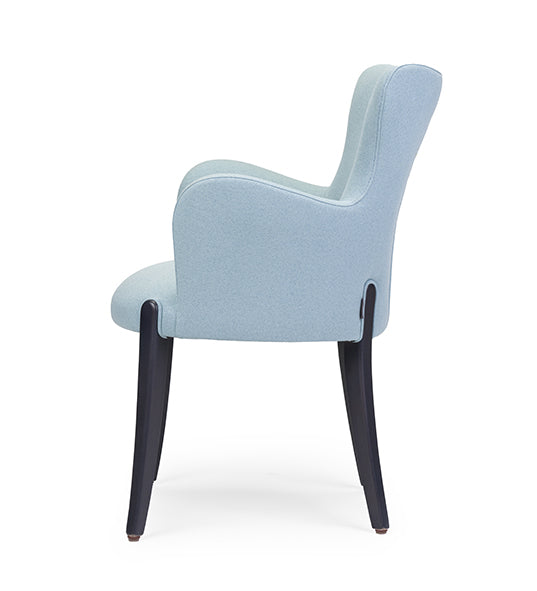 Flower 01 CB armchair with elegant curves and grounded presence | theMADgroup