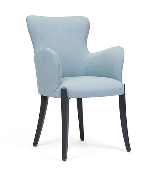 Flower 01 CB armchair with elegant curves and grounded presence | theMADgroup