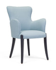 Flower 01 CB armchair with elegant curves and grounded presence | theMADgroup