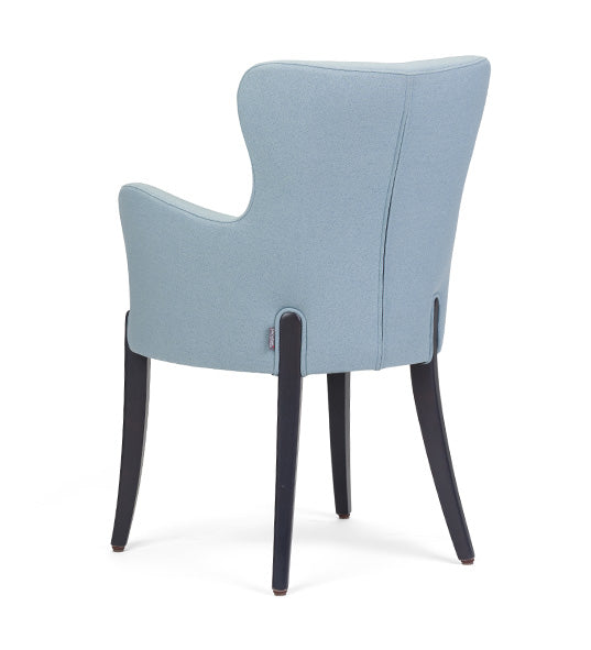 Flower 01 CB armchair with elegant curves and grounded presence | theMADgroup