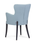 Flower 01 CB armchair with elegant curves and grounded presence | theMADgroup
