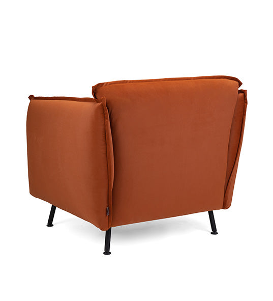 Fluffy Lounge chair with plush form and inviting silhouette | theMADgroup