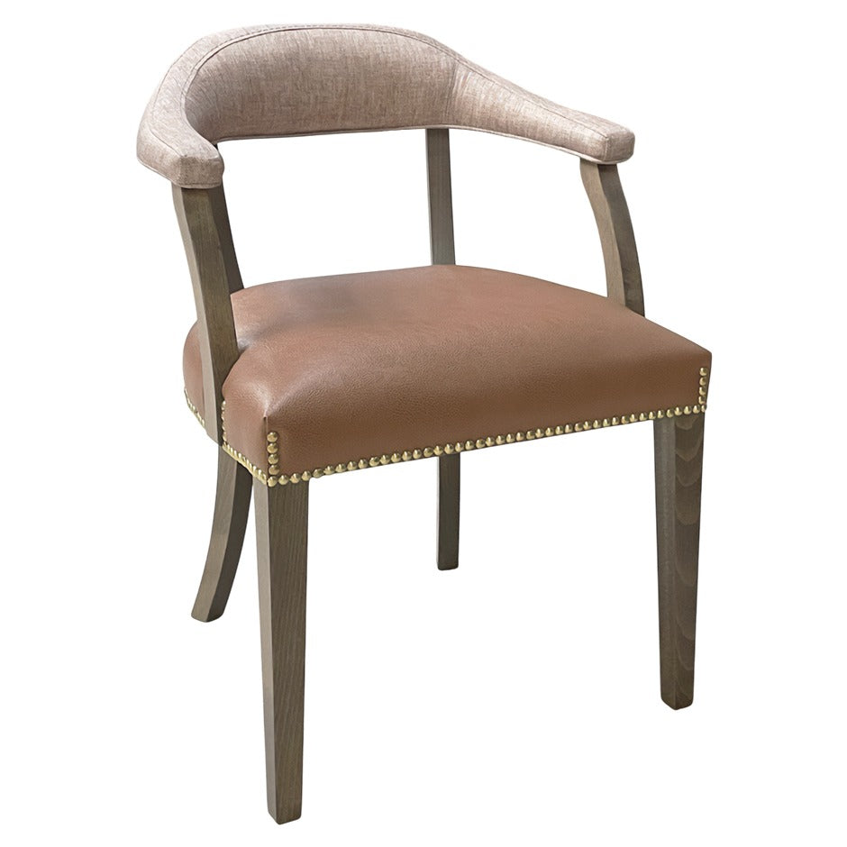  Lila Dining Chairwith wide armrests and plush upholstered cushions | theMADgroup