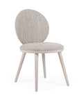 Ronda chair with sleek lines and modern curved backrest | theMADgroup
