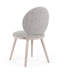 Ronda chair with sleek lines and modern curved backrest | theMADgroup