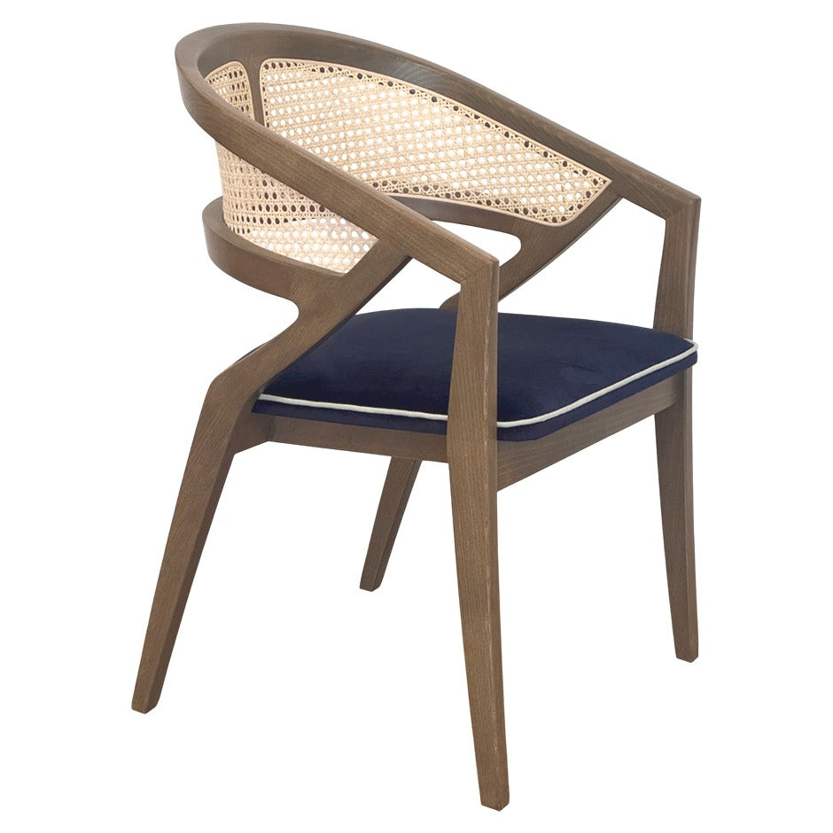 Rory Chair with woven cane back and deep-toned cushion | theMADgroup