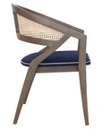 Rory Chair with woven cane back and deep-toned cushion | theMADgroup