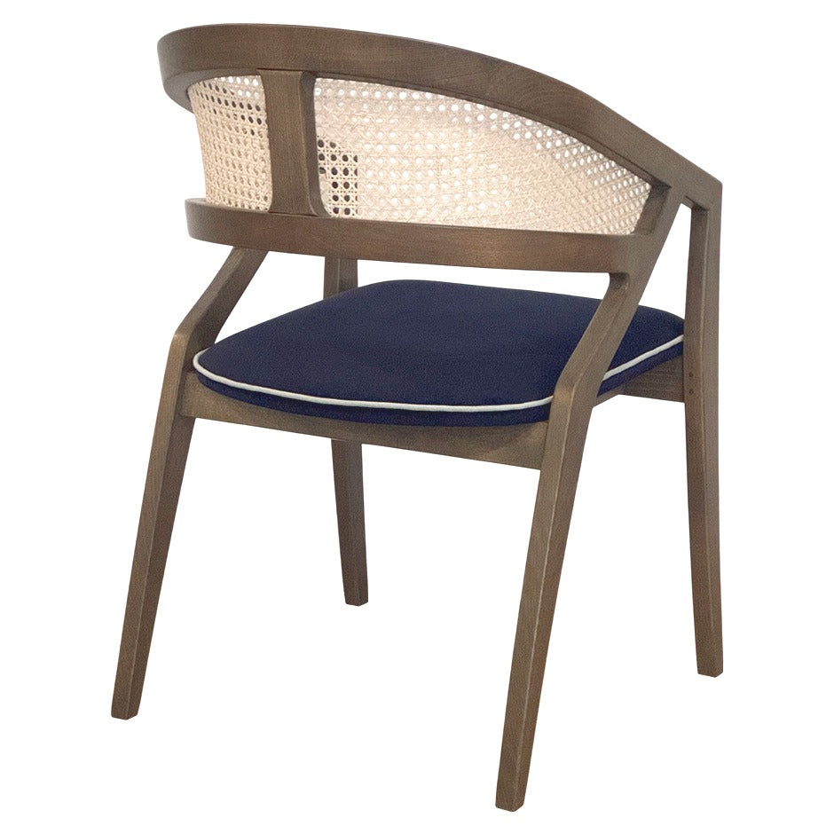 Rory Chair with woven cane back and deep-toned cushion | theMADgroup