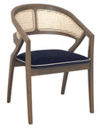 Rory Chair with woven cane back and deep-toned cushion | theMADgroup