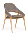Tagada armchair with curved backrest and cozy modern shape | theMADgroup