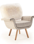 Ivy Armchair with white lamb leather back, wire 02 seat, Paris black piping, and natural oak feet – theMADgroup