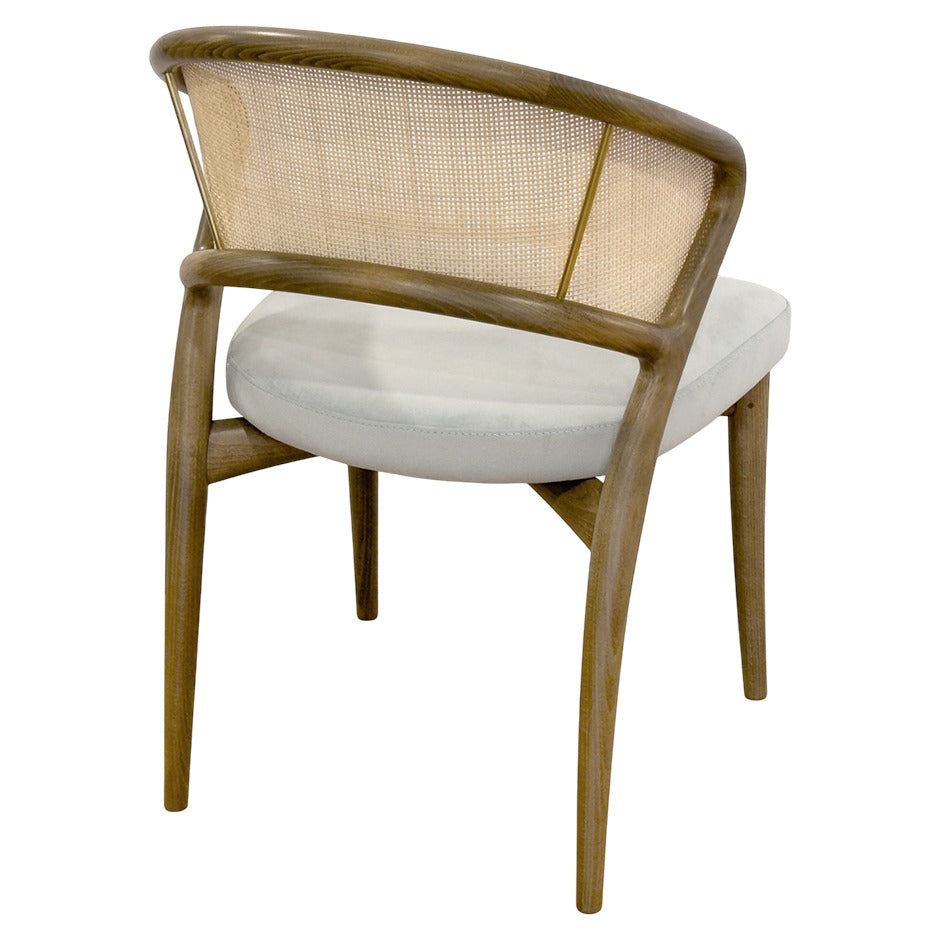 Aura chair with curved wood frame and rattan back | theMADgroup