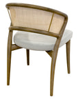Aura chair with curved wood frame and rattan back | theMADgroup