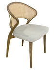 Aura chair with curved wood frame and rattan back | theMADgroup