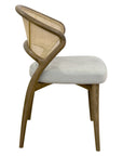 Aura chair with curved wood frame and rattan back | theMADgroup