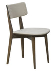 Azur Chair with houndstooth upholstery and wooden legs in dining room | theMADgroup
