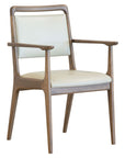 Bergman B Armchair with curved wooden arms and upholstered seat | theMADgroup