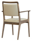 Bergman B Armchair with curved wooden arms and upholstered seat | theMADgroup