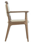 Bergman B Armchair with curved wooden arms and upholstered seat | theMADgroup