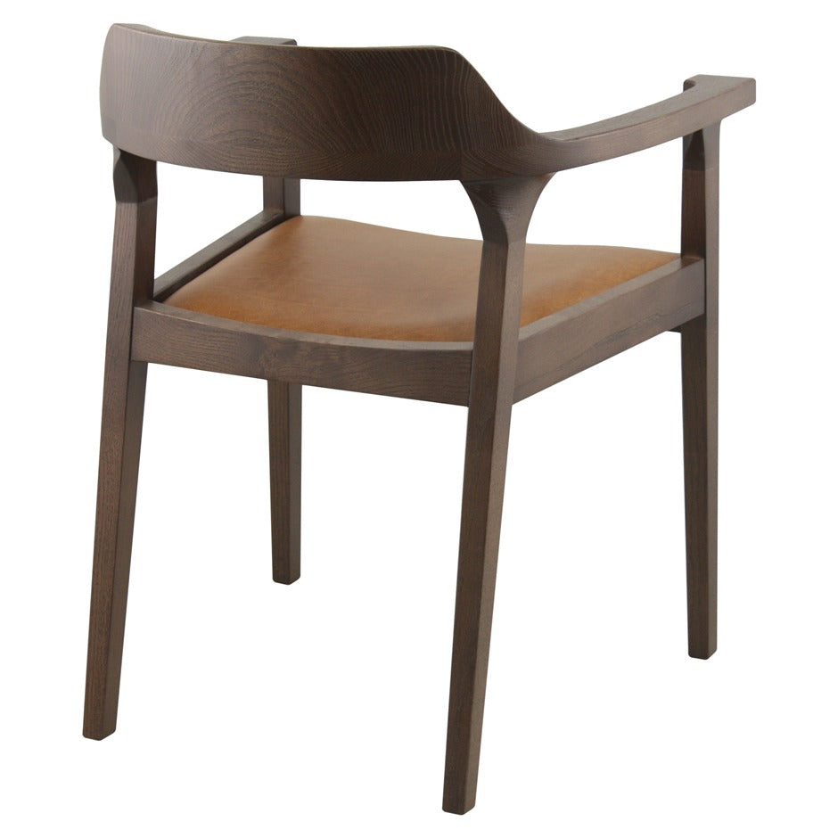 Essen armchair with plush cushions, wide armrests, and modern wood frame | theMADgroup