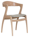Gazelle Chair with sculpted wooden frame and sweeping curved arms | theMADgroup