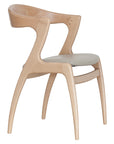 Gazelle Chair with sculpted wooden frame and sweeping curved arms | theMADgroup