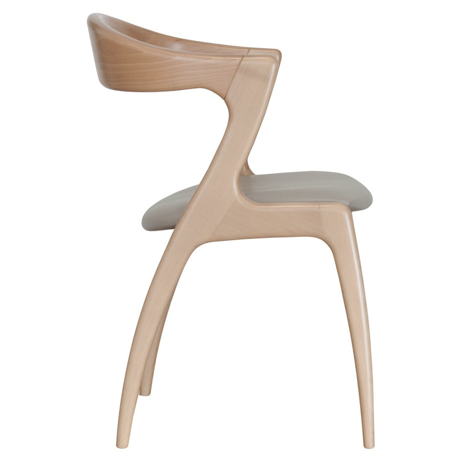 Gazelle Chair with sculpted wooden frame and sweeping curved arms | theMADgroup