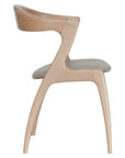 Gazelle Chair with sculpted wooden frame and sweeping curved arms | theMADgroup