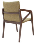 Gula armchair with modern comfort and stylish curved design | theMADgroup