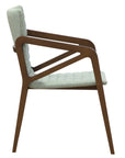 Gula armchair with modern comfort and stylish curved design | theMADgroup