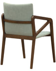 Gula armchair with modern comfort and stylish curved design | theMADgroup