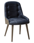 Newton Deluxe Chair with tufted upholstery and wooden legs | theMADgroup