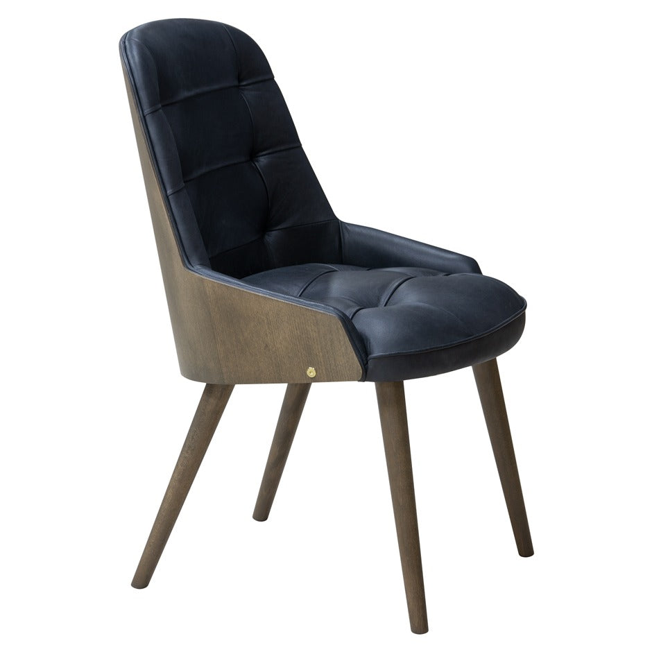 Newton Deluxe Chair with tufted upholstery and wooden legs | theMADgroup