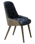 Newton Deluxe Chair with tufted upholstery and wooden legs | theMADgroup