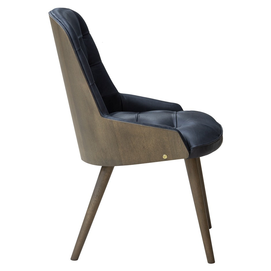 Newton Deluxe Chair with tufted upholstery and wooden legs | theMADgroup