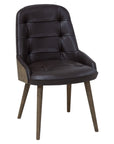 Newton Deluxe Chair with tufted upholstery and wooden legs | theMADgroup