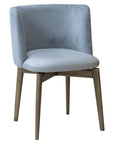 Novara 2B Chair with curved upholstered back and wooden legs | theMADgroup