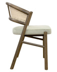 Serrano Chair with curved wooden frame and woven cane back | theMADgroup