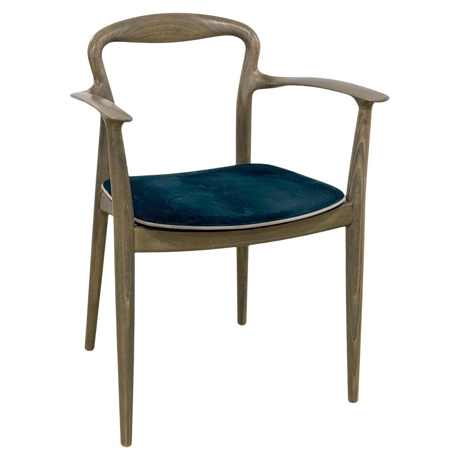 Verona B Chair with sculpted wooden frame and curved arms| theMADgroup
