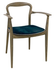 Verona B Chair with sculpted wooden frame and curved arms| theMADgroup