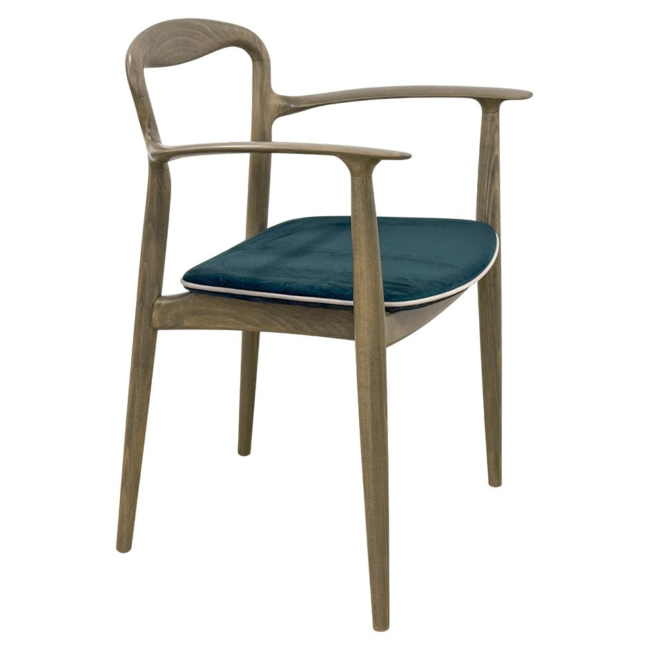 Verona B Chair with sculpted wooden frame and curved arms| theMADgroup